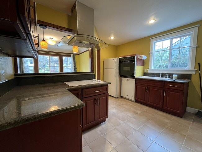 Photo - Classic Brick Portland Home on Stark Street with Dual Living Areas and Two Full Kitchens