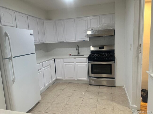 Building Photo - 144-46 26th Ave Unit 2nd Fl