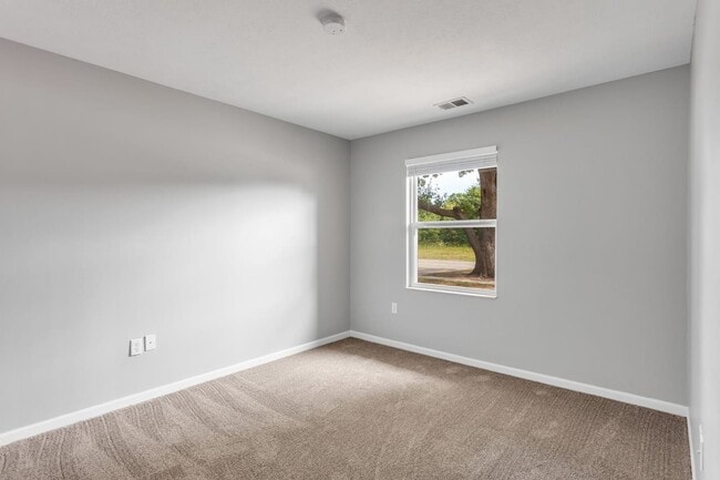 Comfortable bedrooms with plush carpeting and natural light create a peaceful retreat, professionally managed by Highlands Vista Group.