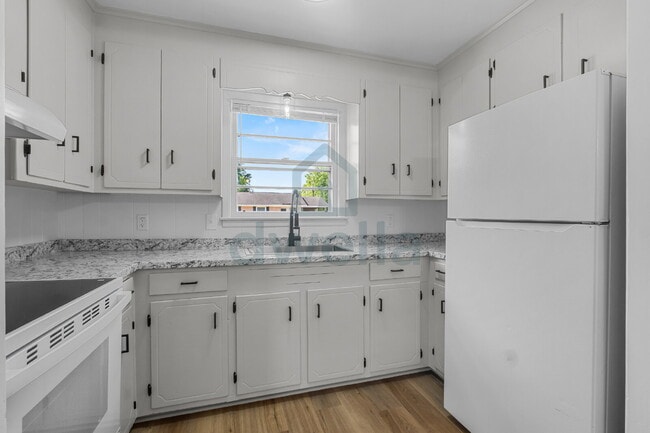 Photo - 3-Bedroom (1.5 Baths) Fully Renovated Rental Home in a PRIME Location! Only 6 minutes to Downtown...