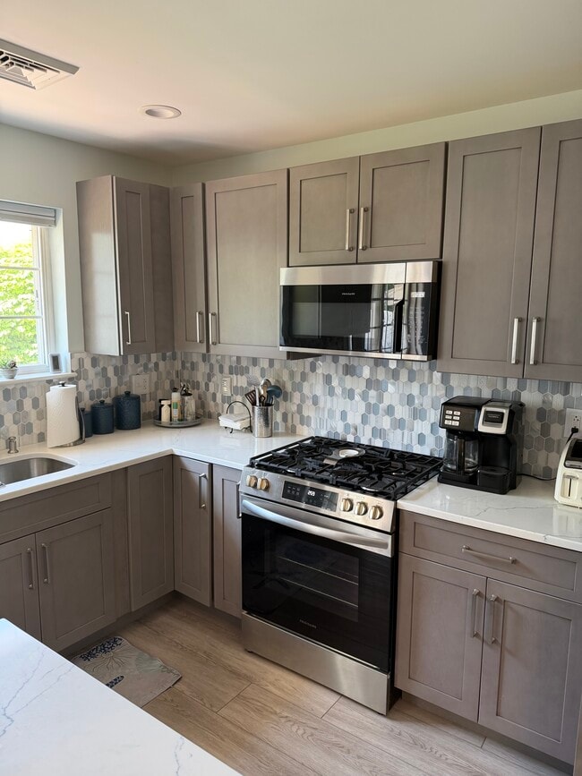 Newly renovated kitchen w/new appliances - 560 Silver Sands Rd Unit 1502