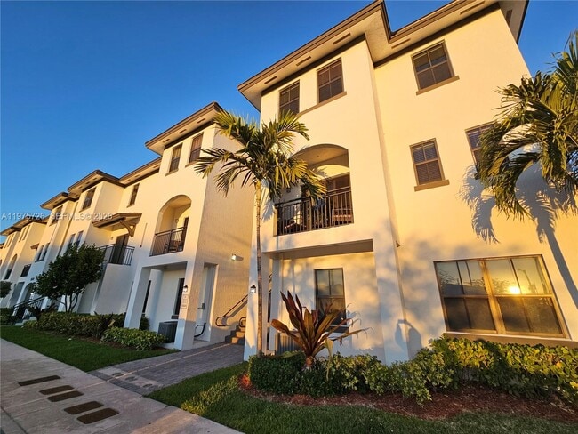 Building Photo - 15520 SW 136th St Unit 106