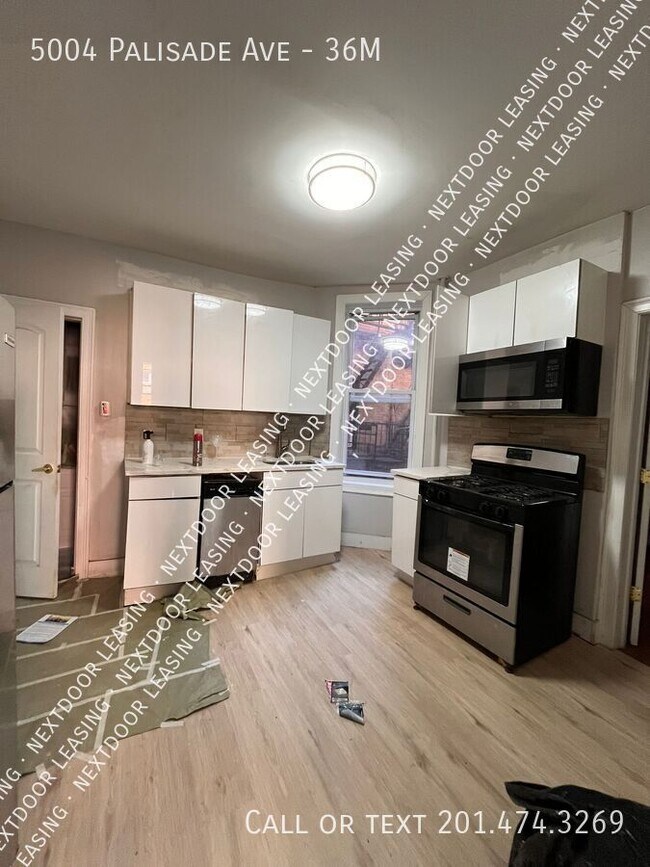 Building Photo - 5004 Palisade Ave Unit 36M