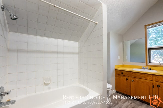 Photo - MAIN FLOOR UNIT With Assigned Parking and Onsite Laundry
