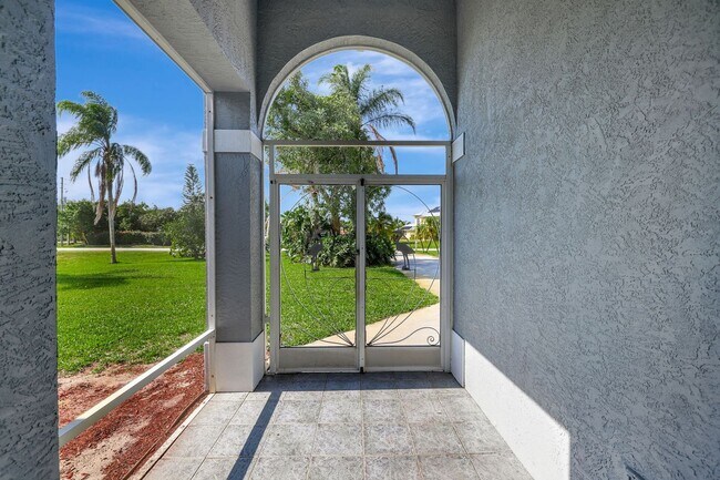 Photo - A BOATER'S PARADISE WITH THIS STUNNING 3 BEDROOM, 2 BATH WATERFRONT POOL HOME W/DOCK & BOAT LIFT ...