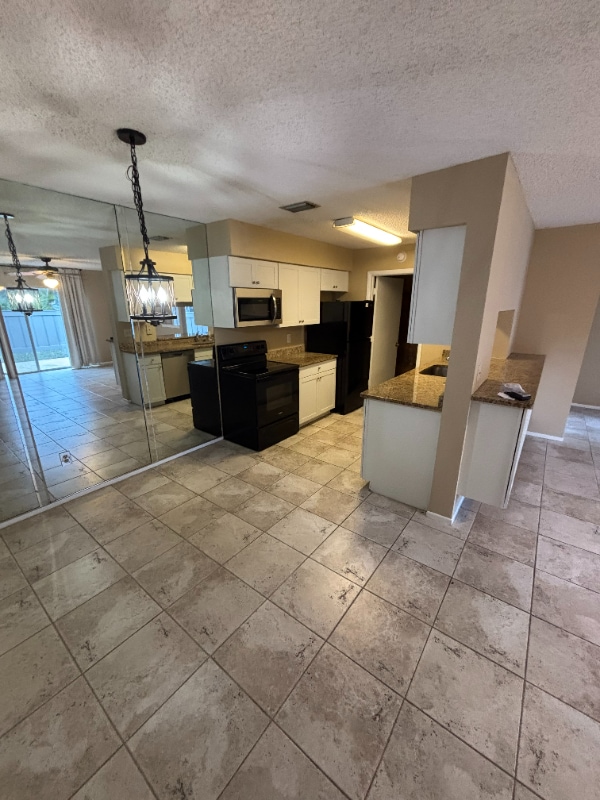 Photo - 3999 NW Cinnamon Tree Cir Unit 3999