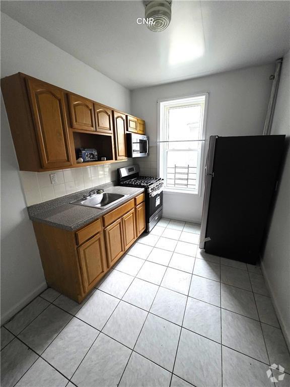 Building Photo - 361 E 54th St Unit 4 Rental