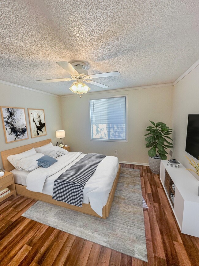 Relax in cozy bedrooms that offer plenty of storage and natural light, creating a perfect retreat at the end of the day. - Whisperwood Apartments