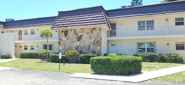 Building Photo - 12003 Poinciana Blvd Unit 204
