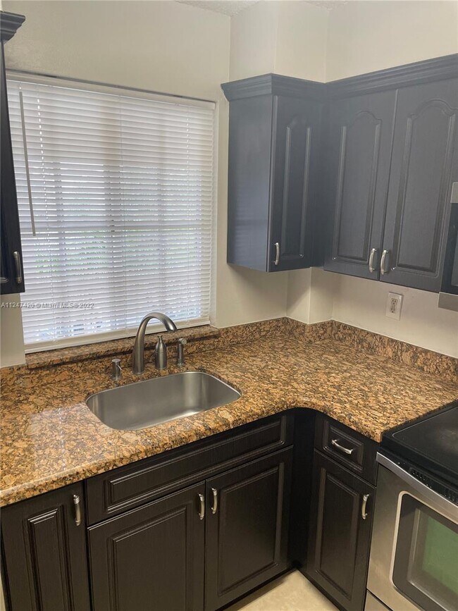 Photo - 6045 NW 186th St Unidad 301