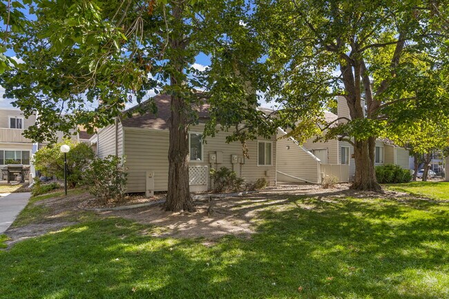 Updated Two-Bedroom with Carport Parking Next to Golf Course