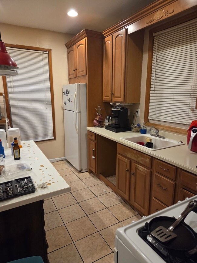 Photo - 5BR/1.5BA Row Home with Backyard and Laund...