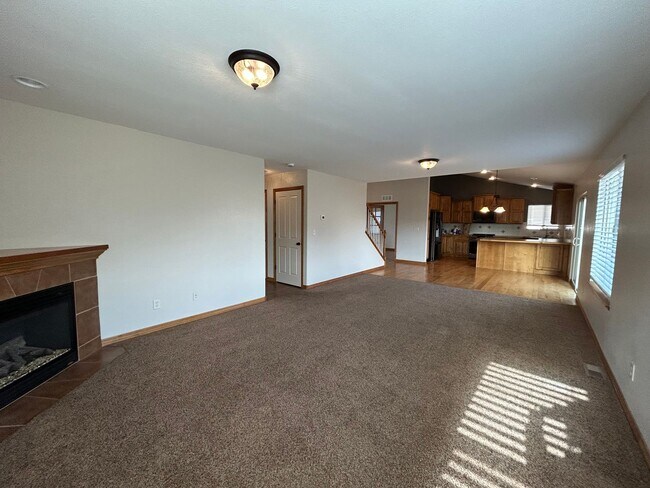 Photo - Spacious 5-Bedroom Home with Finished Basement and 3-Car Garage in Wellington