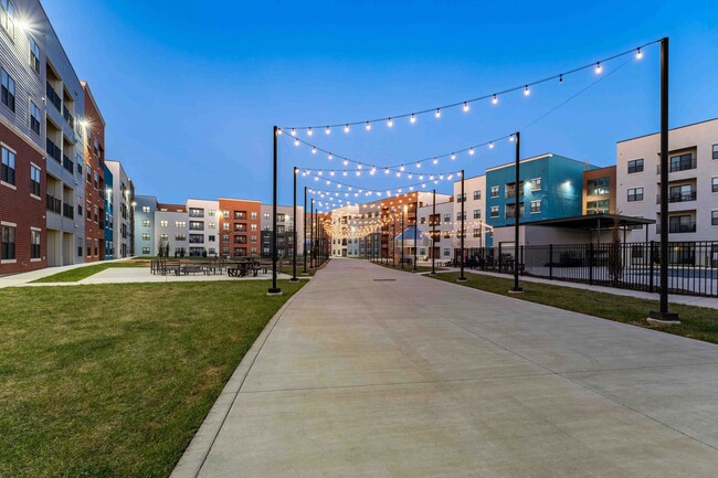 Step into the vibrant atmosphere of Union Mill, where modern living meets inviting outdoor spaces. Stroll along well-lit pathways adorned with stunning views, perfect for unwinding after a long day. Explore your future home today! - Union Mill