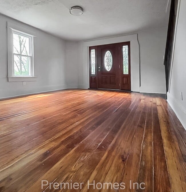 Photo - 3 Bed Home with Hardwood Floors & Rear Deck – $1,495/mo