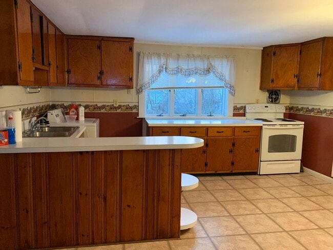 Photo - Multi-level 3-bedroom, 1-bath single-family home