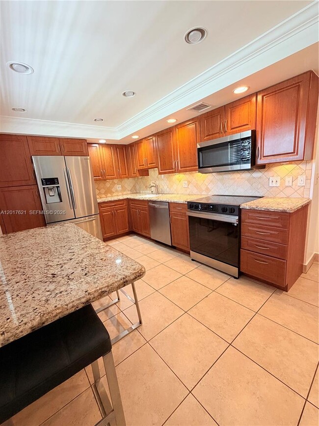 Building Photo - 4020 W Palm Aire Dr Unit 403
