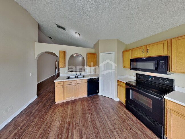 Photo - 6606 Gentle Oaks Dr N