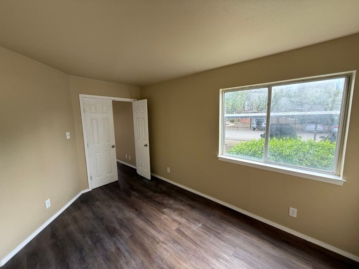 Photo - For lease! Well-located 1 bed, 1 bath condo with access to a community pool and a covered parking...