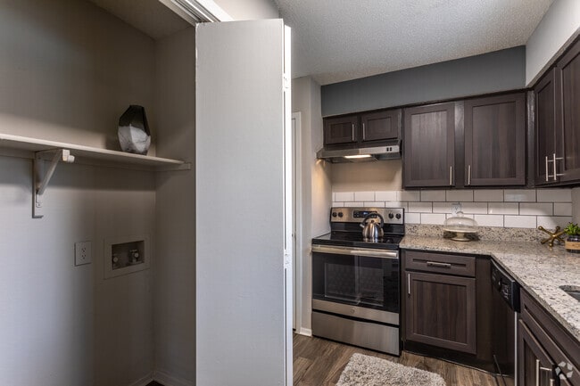 1BR, 1BA - 674SF A1 - Kitchen/Laundry Area