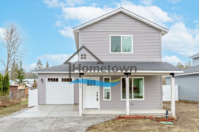 Building Photo - 3 Bedroom Home with 1.5 Bathrooms and an A...