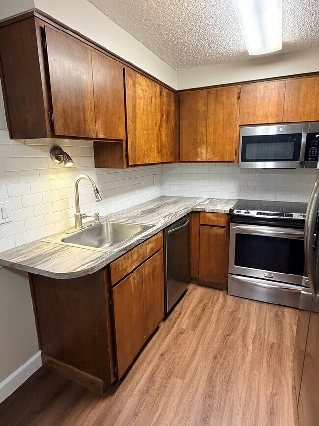 Photo - Beautiful Home in Fabulous Loacation! SS Appliances, NEW Carpet, Patio, W/D, Includes W/S/G!