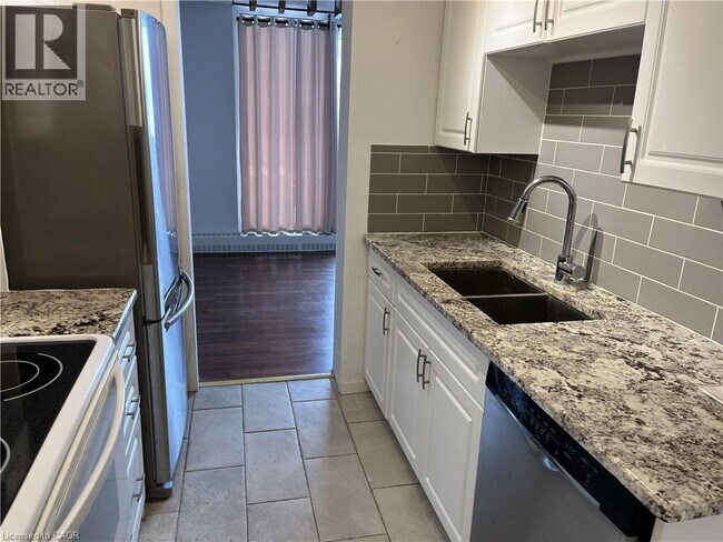 Photo - 225 Harvard Pl Unité 603