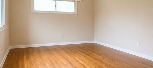 Photo - Charming 3-Bedroom Home with Hardwood Floors, Garage & Private Patio