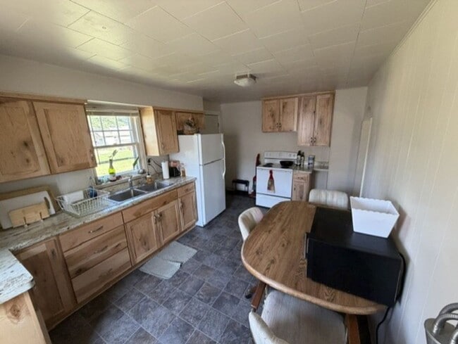 Photo - 3 bedroom, 1 bath. Large yard with large storage shed.