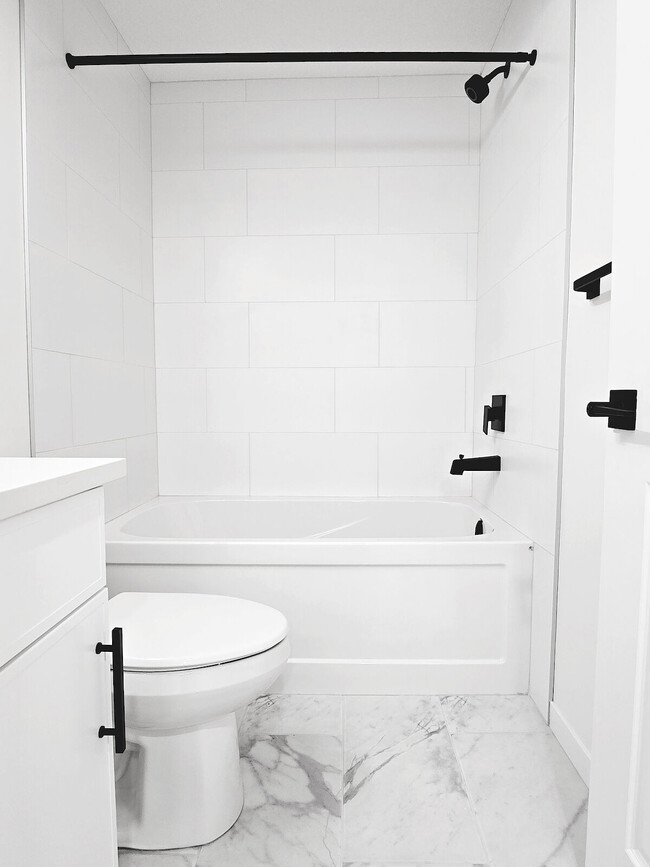 Photo - 11919-11955 55 St NW Unit BSMT 1