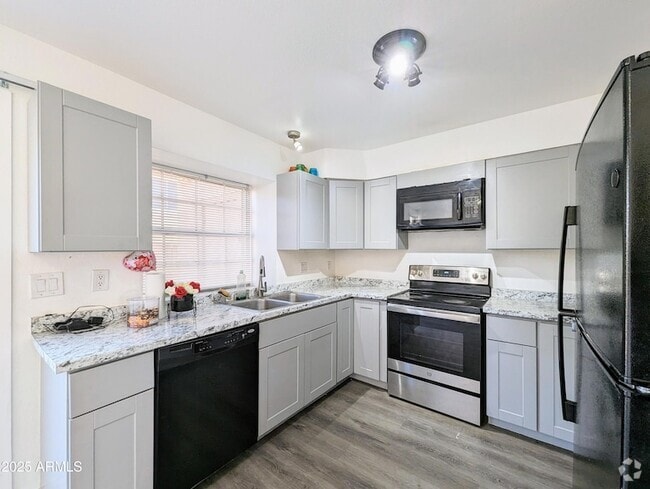Building Photo - 4601 N 102nd Ave Rental