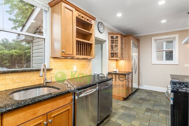 Photo - Spacious 3BR Home with Finished Attic, Fenced Yard & Easy NYC Commute – No Broker Fee