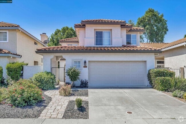 Building Photo - Updated Mediterranean-style home in Renais...