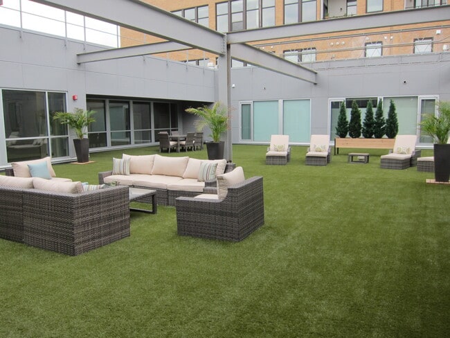 Peregrine Plaza Outdoor courtyard common area for residents - Peregrine Plaza