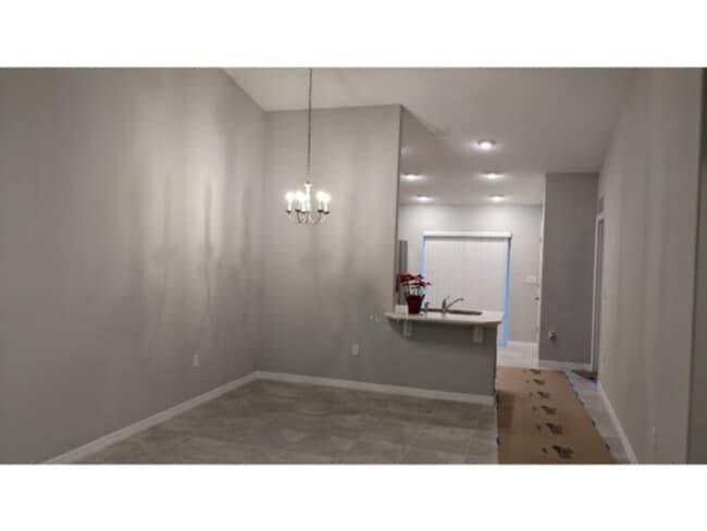 Photo - Spacious 4 bedroom/2 bath/ 2 car garage Duplex. www.WeRentSunshine.com