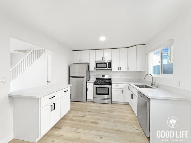 Photo - Two-Level 2-Bed/1-Bath Condo in Normal Heights | Granite Counters, Central A/C + In-Unit Laundry Unit 4370