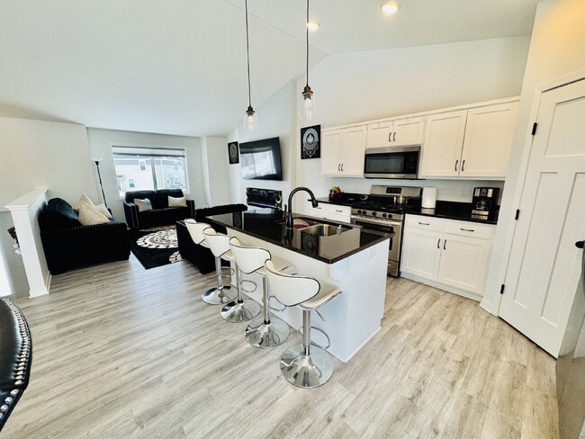 Photo - Newer Development Home Spacious 4-Bedroom 3 Bathroom Single Family Home with Finished Basement in...