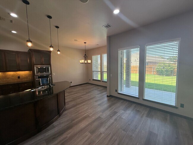 Photo - 3 bed plus office, Neighborhood amenities include a neighborhood pond, Pool and playground!