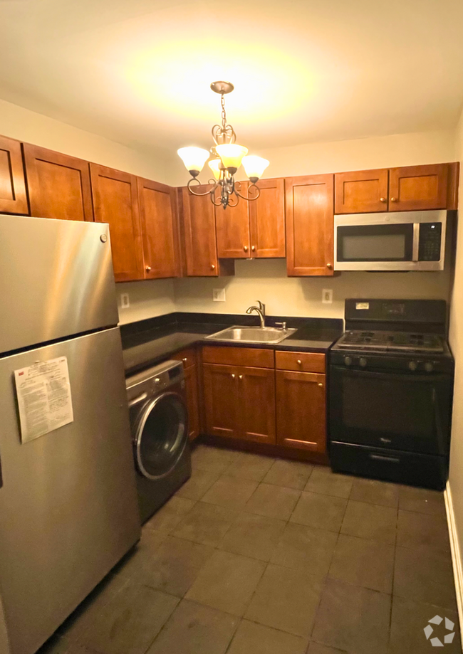 Building Photo - NEWLY AVAILABLE - RENOVATED 2 BR Unit 101 Rental