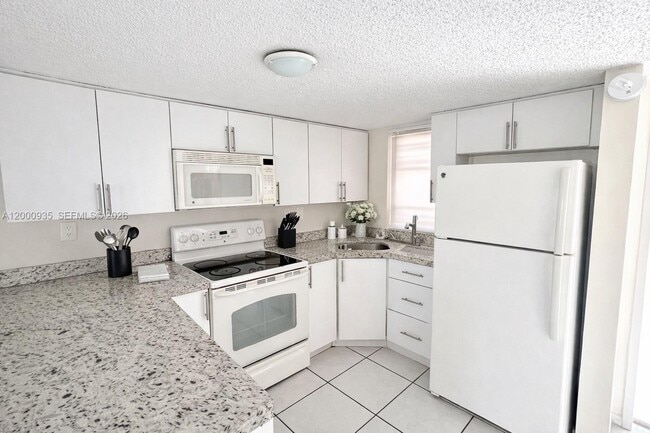 Photo - 5575 W 26th Ct Unit 203