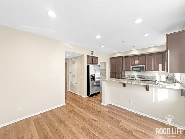 Photo - Modern 3-Story Townhome in Bay Park – 3BR/3.5BA with Pool, Balcony & In-Unit Laundry
