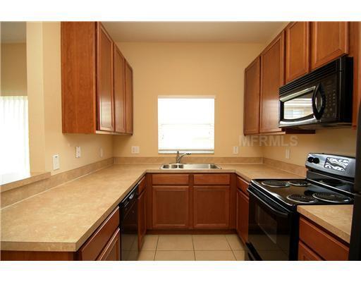 Photo - Luxury Gated 3BR 2.5 Bath Sanford Townhome with garage and pool