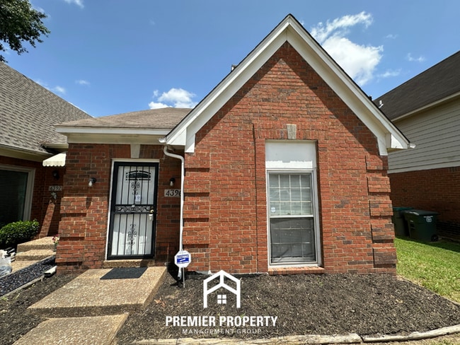 Building Photo - Beautiful 3BR/2BA Near Southwind | Soaring Vaulted Ceilings, Fireplace & Quiet Cove