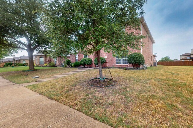 Photo - Spacious 4-Bedroom Home with Bonus Room and Large Backyard in Caruth Lake
