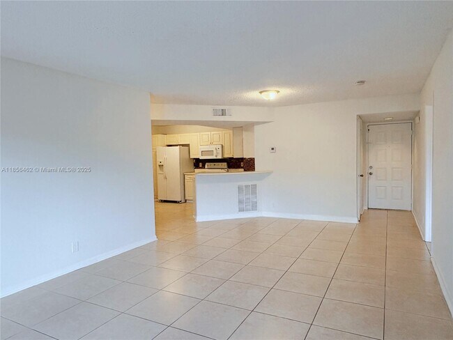 Photo - 9055 Wiles Rd Unit 204