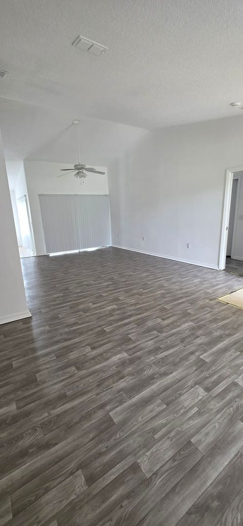 Photo - Spacious 3BR/2BA Home with Screened Patio and 2-Car Garage