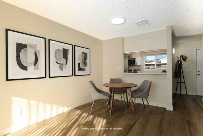 2 BR, 1.5BA Townhouse Dining Area (staged)