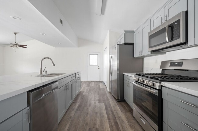 Photo - Oversized kitchen and living area!
