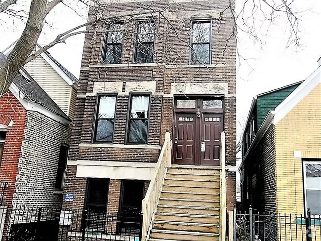 Building Photo - 2031 W Moffat St Unit 1 Rental