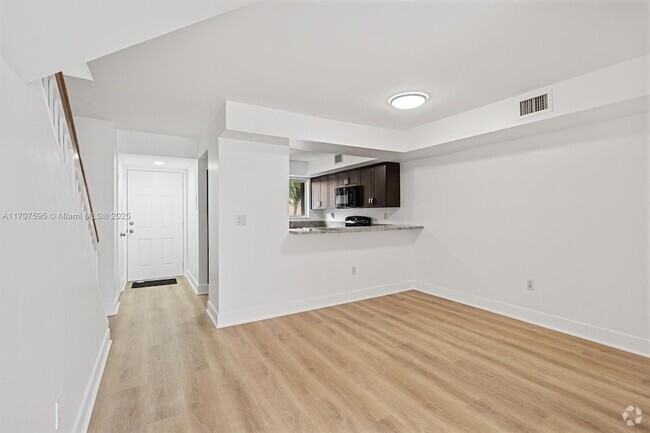 Building Photo - 14909 SW 80th St Unit 207 Rental